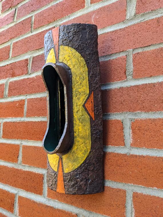 Forest Gate (2024) Red stoneware, oxide washes, underglaze, glaze, upcycled glass. Electric fired. Cold worked. Wall piece. Half pipe.