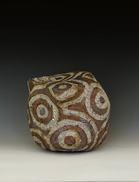 CONCENTRICS (2024) Red stoneware, glaze, 2 firings. Private collection.